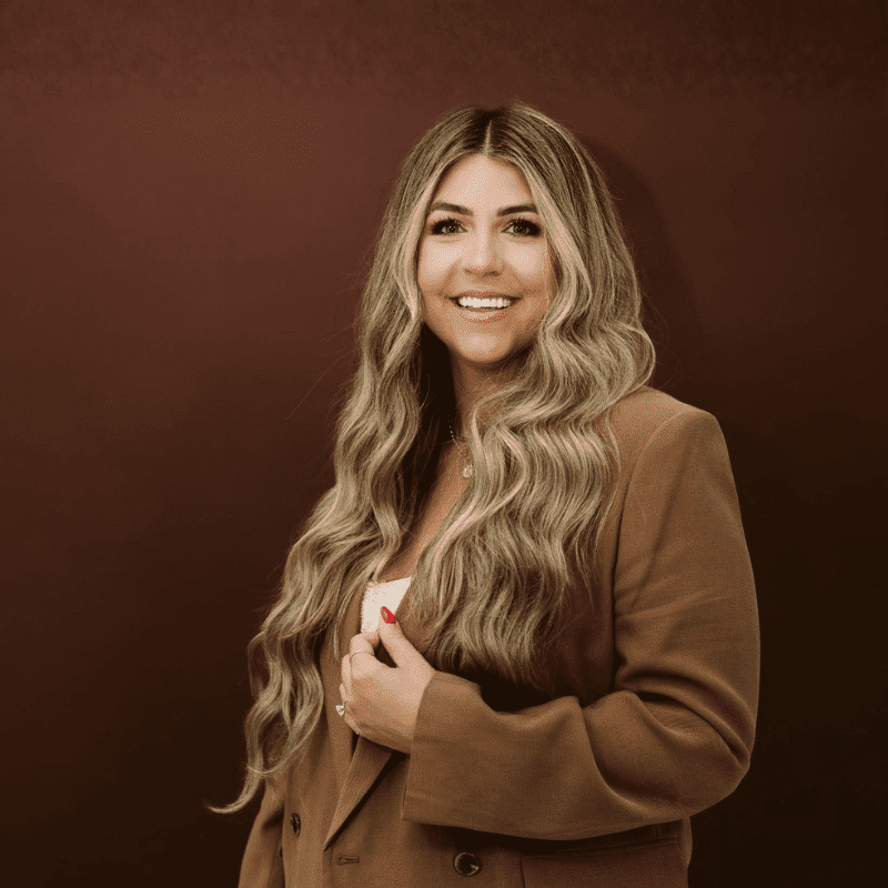 Portrait of Christina, a professional stylist at House of Rose Styling Co., showcasing their expertise and style.