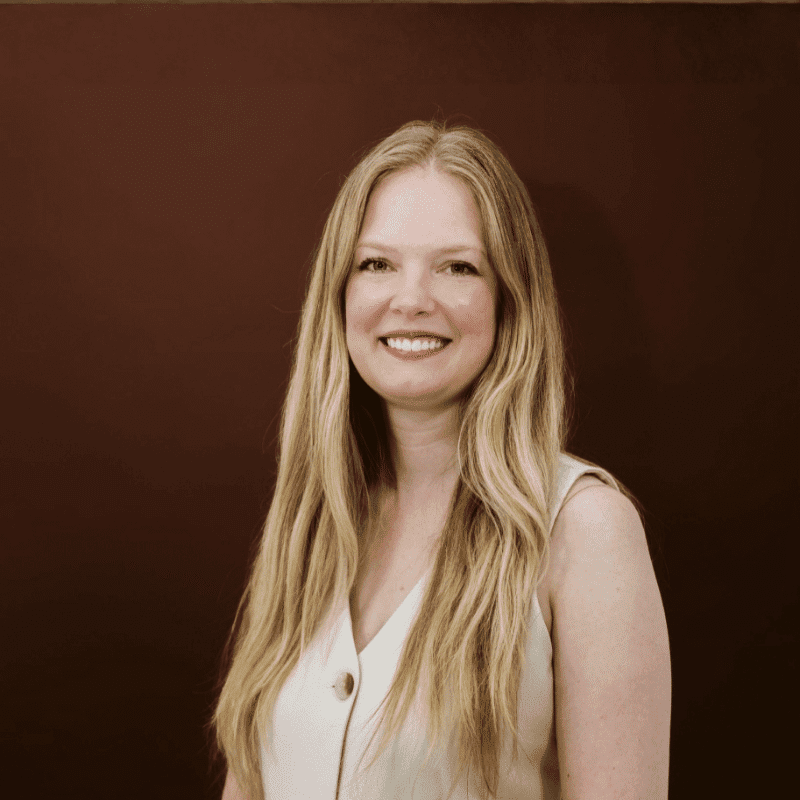 Portrait of Beccah, a professional stylist at House of Rose Styling Co., showcasing their expertise and style.